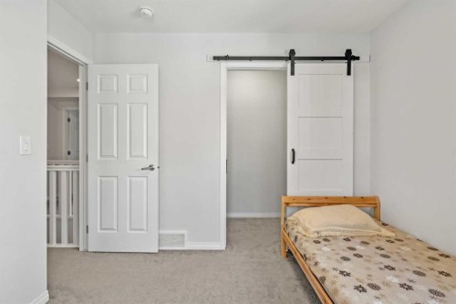 192 Carrington Crescent Nw, Calgary, AB - Indoor Photo Showing Bedroom