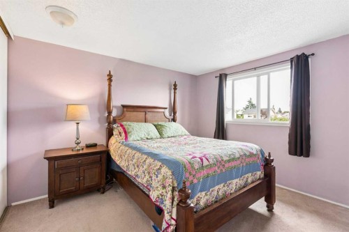 152 Erin Dale Crescent Se, Calgary, AB - Indoor Photo Showing Bedroom