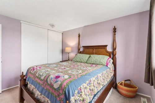 152 Erin Dale Crescent Se, Calgary, AB - Indoor Photo Showing Bedroom