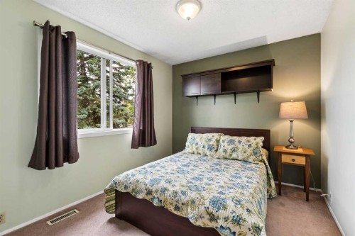 152 Erin Dale Crescent Se, Calgary, AB - Indoor Photo Showing Bedroom