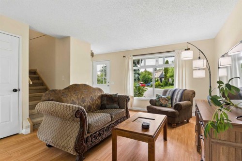 152 Erin Dale Crescent Se, Calgary, AB - Indoor Photo Showing Living Room