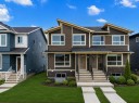 209 Bridgeport Gate North, Chestermere, AB  - Outdoor With Facade 