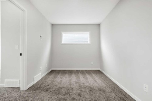 209 Bridgeport Gate North, Chestermere, AB - Indoor Photo Showing Other Room