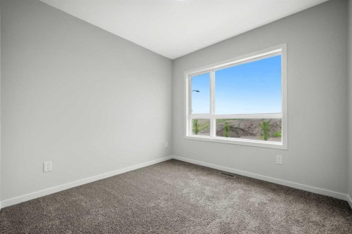 209 Bridgeport Gate North, Chestermere, AB - Indoor Photo Showing Other Room