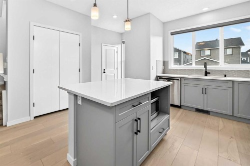 113 Midtown Close Sw, Airdrie, AB - Indoor Photo Showing Kitchen With Upgraded Kitchen