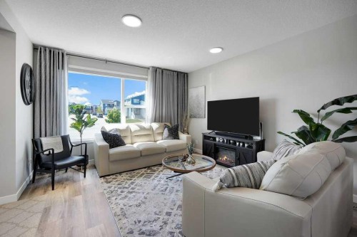 244 Belmont Boulevard Sw, Calgary, AB - Indoor Photo Showing Living Room
