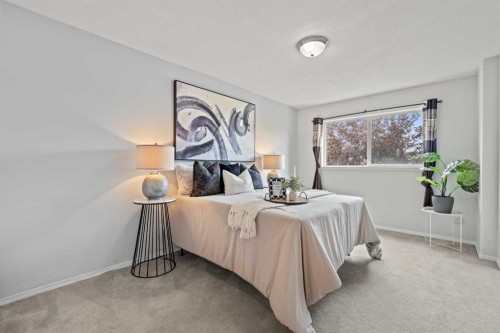 6591 Pinecliff Grove Ne, Calgary, AB - Indoor Photo Showing Bedroom