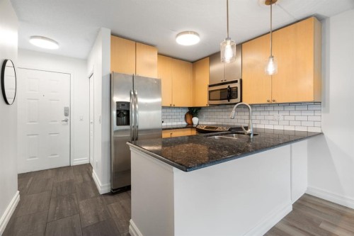120-25 Richard Place Sw, Calgary, AB - Indoor Photo Showing Kitchen With Stainless Steel Kitchen