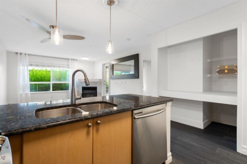 120-25 Richard Place Sw, Calgary, AB - Indoor Photo Showing Kitchen With Double Sink