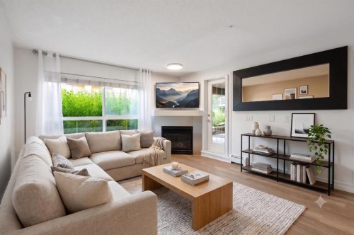 120-25 Richard Place Sw, Calgary, AB - Indoor Photo Showing Living Room With Fireplace