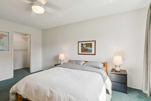 98 River Rock Way Se, Calgary, AB - Indoor Photo Showing Bedroom