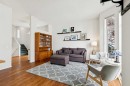 98 River Rock Way Se, Calgary, AB  - Indoor Photo Showing Living Room 