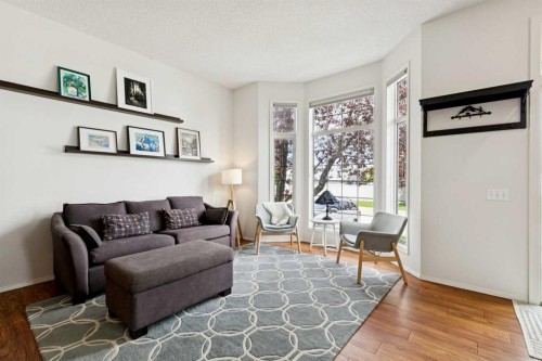 98 River Rock Way Se, Calgary, AB - Indoor Photo Showing Living Room