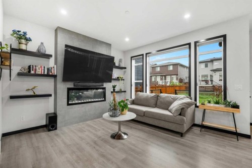 119 Howse Hill Ne, Calgary, AB - Indoor Photo Showing Living Room With Fireplace