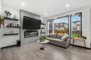 119 Howse Hill Ne, Calgary, AB  - Indoor Photo Showing Living Room With Fireplace 