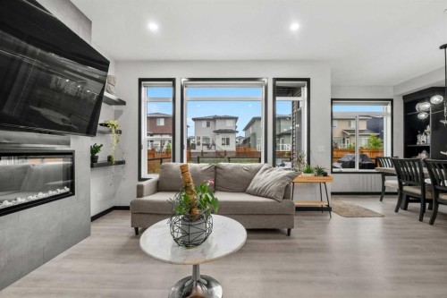 119 Howse Hill Ne, Calgary, AB - Indoor Photo Showing Living Room With Fireplace