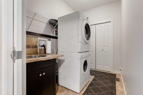 202 Silverado Bank Circle Sw, Calgary, AB - Indoor Photo Showing Laundry Room