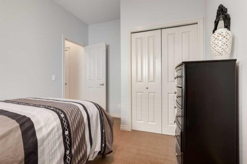 202 Silverado Bank Circle Sw, Calgary, AB - Indoor Photo Showing Bedroom