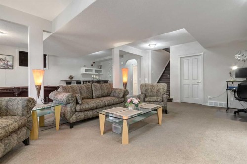 202 Silverado Bank Circle Sw, Calgary, AB - Indoor Photo Showing Living Room