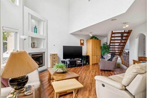 23 Sierra Nevada Close Sw, Calgary, AB - Indoor Photo Showing Living Room With Fireplace