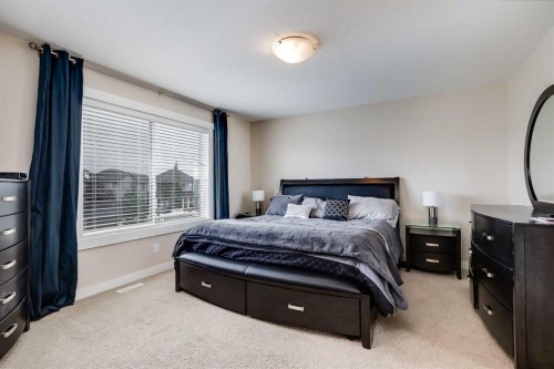 1701-1086 Williamstown Boulevard Nw, Airdrie, AB - Indoor Photo Showing Bedroom