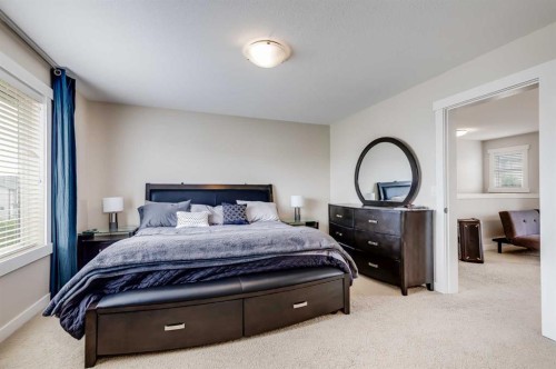 1701-1086 Williamstown Boulevard Nw, Airdrie, AB - Indoor Photo Showing Bedroom