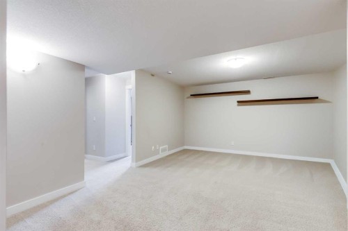 1701-1086 Williamstown Boulevard Nw, Airdrie, AB - Indoor Photo Showing Other Room