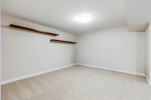 1701-1086 Williamstown Boulevard Nw, Airdrie, AB - Indoor Photo Showing Other Room