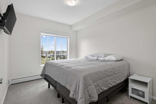 5413-755 Copperpond Boulevard Se, Calgary, AB - Indoor Photo Showing Bedroom