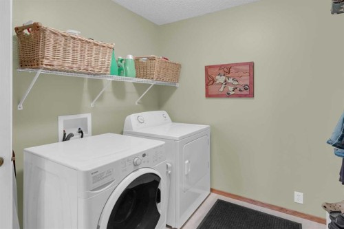 264 Tuscany Ridge View Nw, Calgary, AB - Indoor Photo Showing Laundry Room