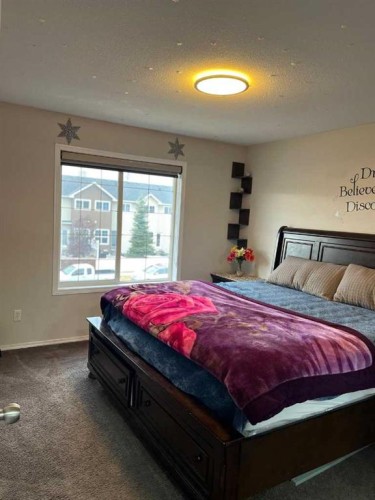 50 Tarawood Lane Ne, Calgary, AB - Indoor Photo Showing Bedroom