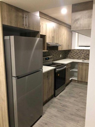 50 Tarawood Lane Ne, Calgary, AB - Indoor Photo Showing Kitchen With Upgraded Kitchen