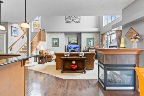 22 Westfall Drive, Okotoks, AB - Indoor With Fireplace