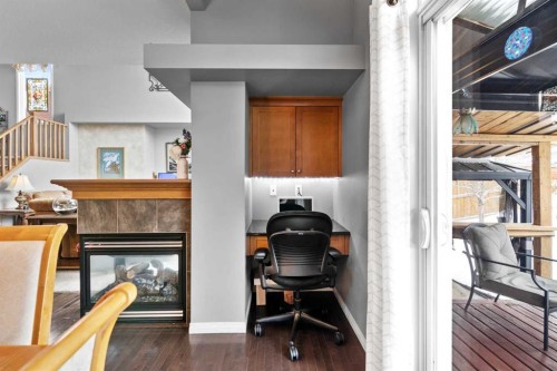 22 Westfall Drive, Okotoks, AB - Indoor With Fireplace