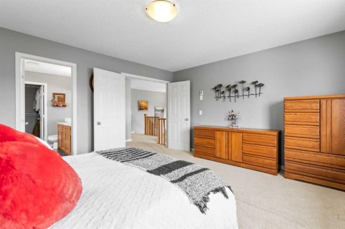 22 Westfall Drive, Okotoks, AB - Indoor Photo Showing Bedroom