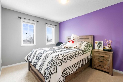 22 Westfall Drive, Okotoks, AB - Indoor Photo Showing Bedroom