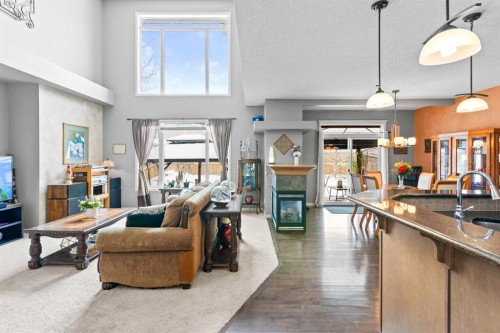 22 Westfall Drive, Okotoks, AB - Indoor With Fireplace