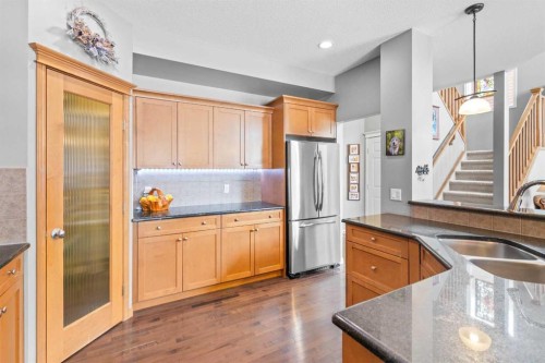 22 Westfall Drive, Okotoks, AB - Indoor Photo Showing Kitchen With Double Sink