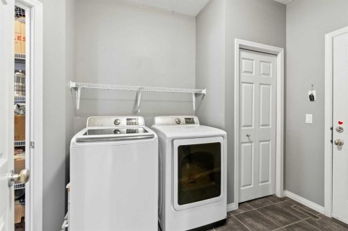 22 Westfall Drive, Okotoks, AB - Indoor Photo Showing Laundry Room