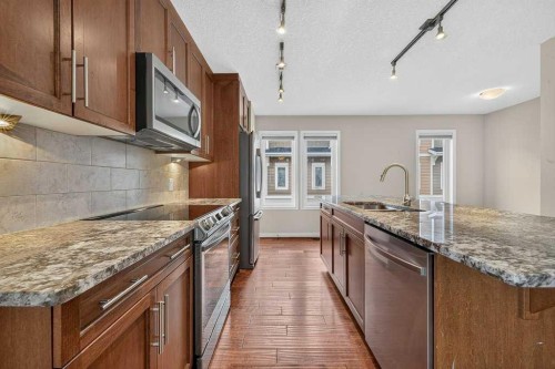 721 Auburn Bay Square Se, Calgary, AB - Indoor Photo Showing Kitchen With Upgraded Kitchen
