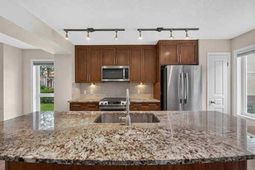 721 Auburn Bay Square Se, Calgary, AB - Indoor Photo Showing Kitchen With Stainless Steel Kitchen With Double Sink With Upgraded Kitchen