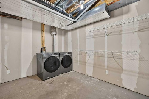 721 Auburn Bay Square Se, Calgary, AB - Indoor Photo Showing Laundry Room
