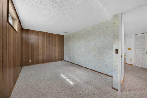 135 Huntcroft Way Ne, Calgary, AB - Indoor Photo Showing Other Room