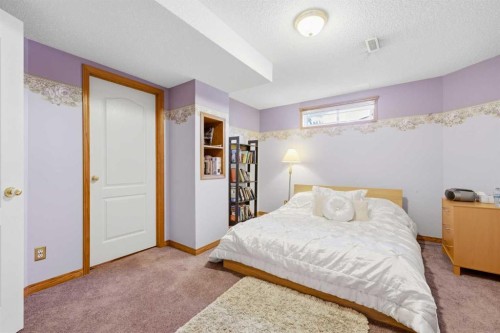 71 Woodpark Close Sw, Calgary, AB - Indoor Photo Showing Bedroom