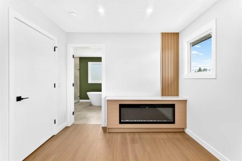 1204 Lake Sylvan Drive Se, Calgary, AB - Indoor With Fireplace