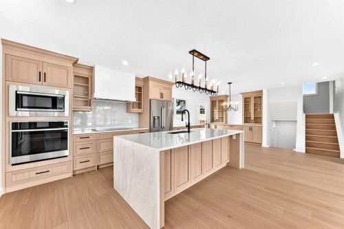 1204 Lake Sylvan Drive Se, Calgary, AB - Indoor Photo Showing Kitchen With Upgraded Kitchen