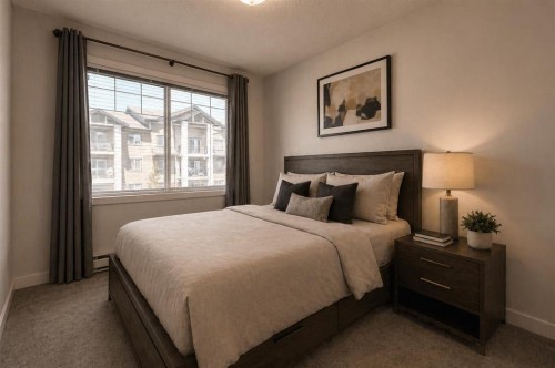 207-22 Panatella Road Nw, Calgary, AB - Indoor Photo Showing Bedroom