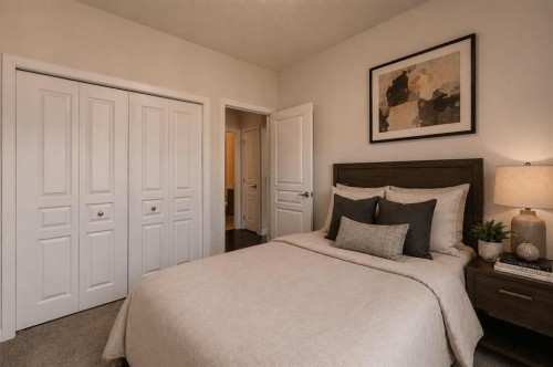 207-22 Panatella Road Nw, Calgary, AB - Indoor Photo Showing Bedroom