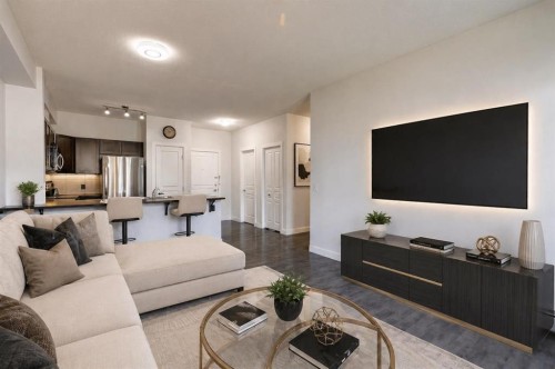 207-22 Panatella Road Nw, Calgary, AB - Indoor Photo Showing Living Room