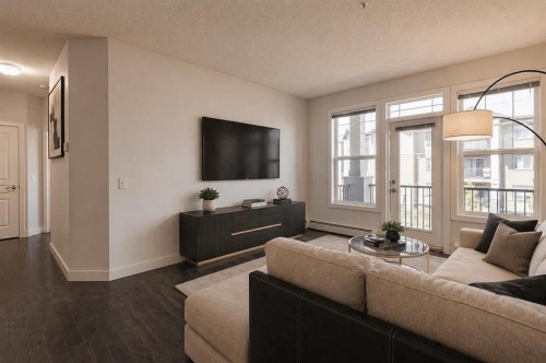 207-22 Panatella Road Nw, Calgary, AB - Indoor Photo Showing Living Room